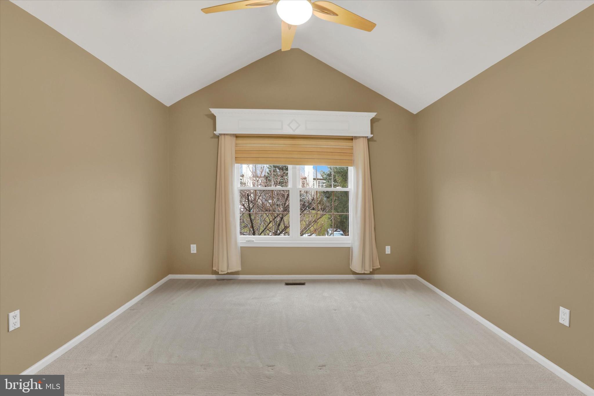 102 Julian Drive East, Unit E Warminster, PA 18974 - Photo 14 of 28 an empty room with a window