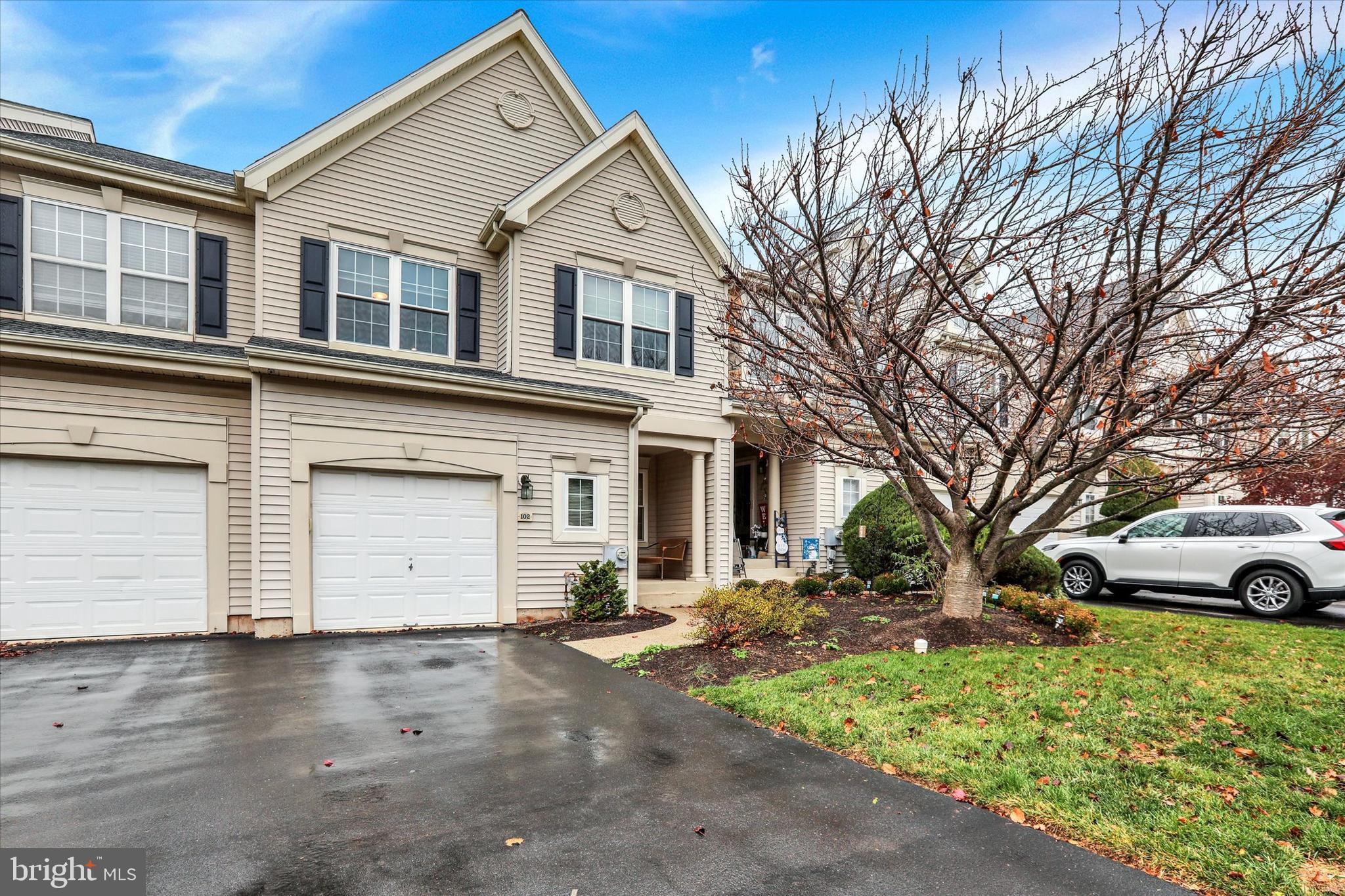 102 Julian Drive East, Unit E Warminster, PA 18974 - Photo 28 of 28 a front view of a house with a yard