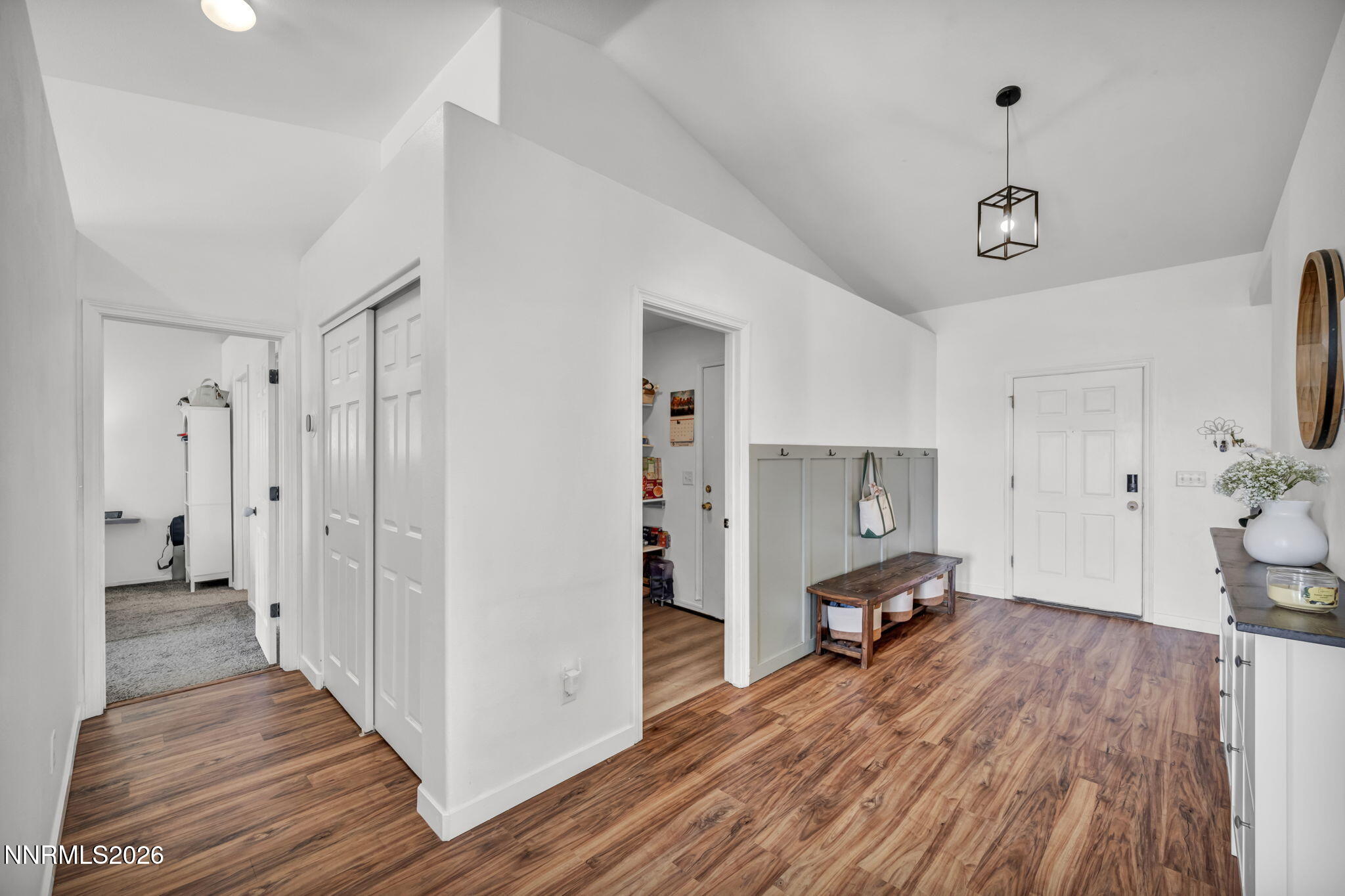 111 Relief Springs Road Fernley, NV 89408 - Photo 14 of 30 a bedroom with wooden floor and bathroom
