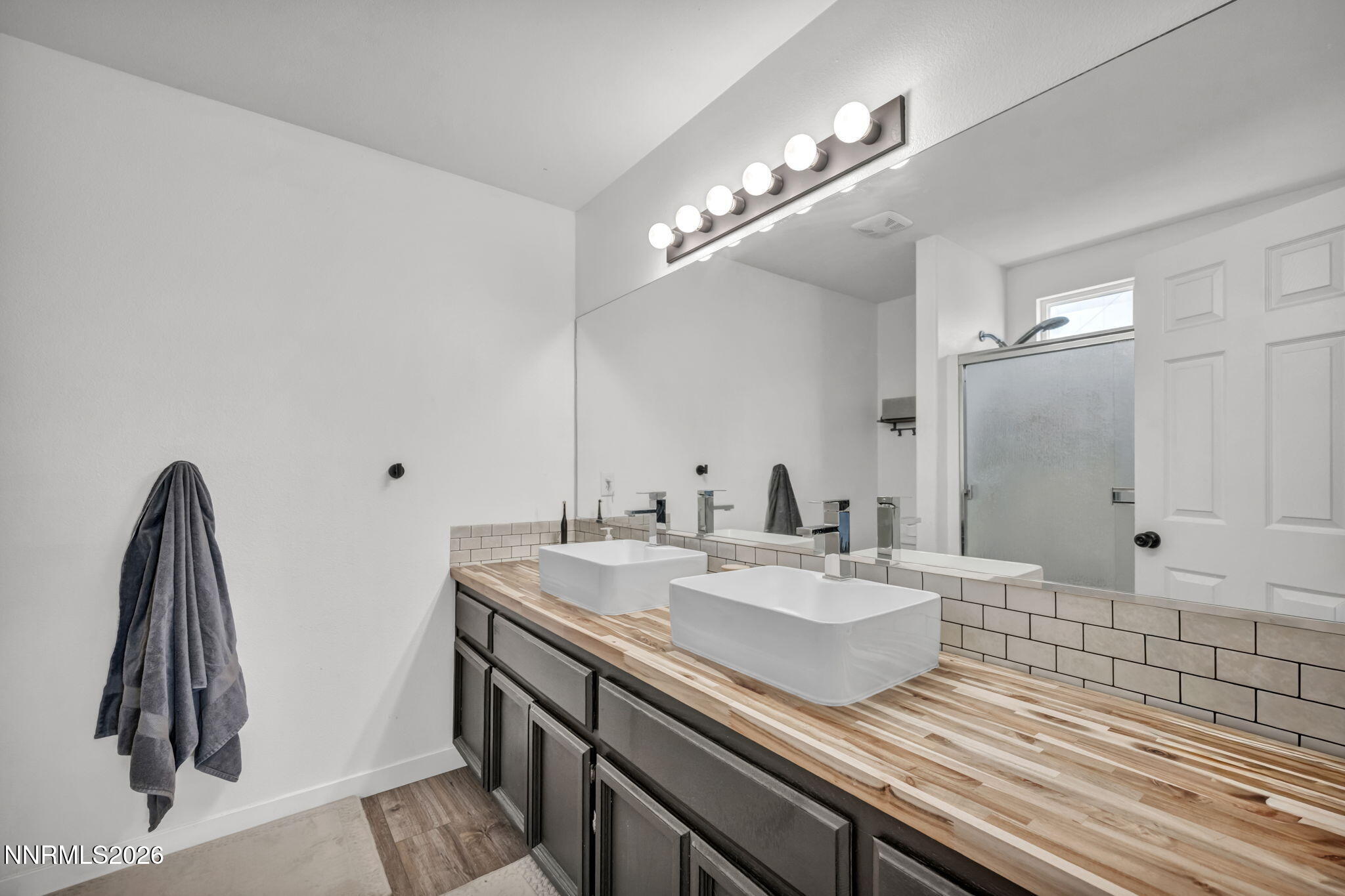 111 Relief Springs Road Fernley, NV 89408 - Photo 18 of 30 a bathroom with a sink and a mirror