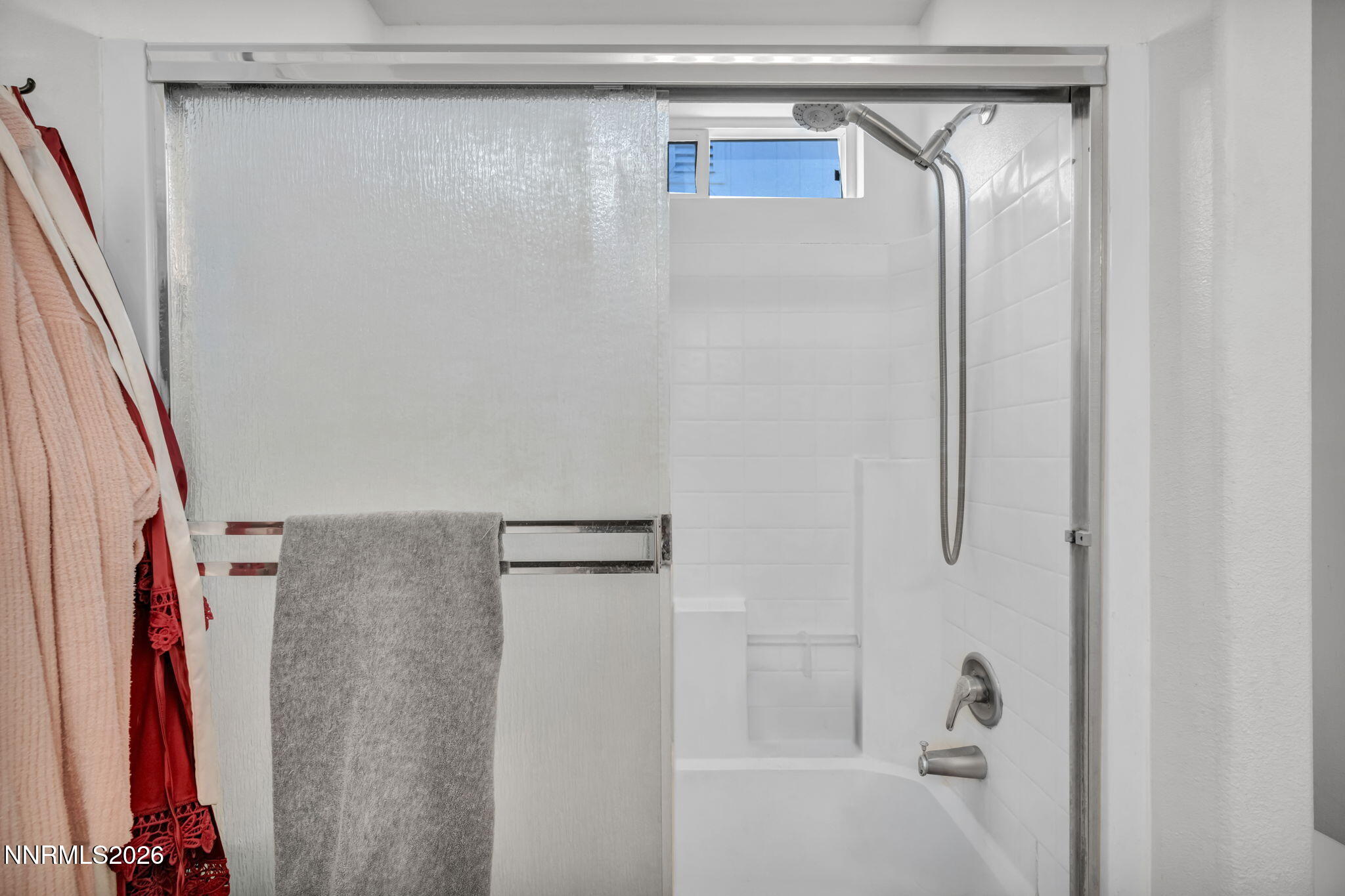 111 Relief Springs Road Fernley, NV 89408 - Photo 19 of 30 a bathroom with a shower and a sink