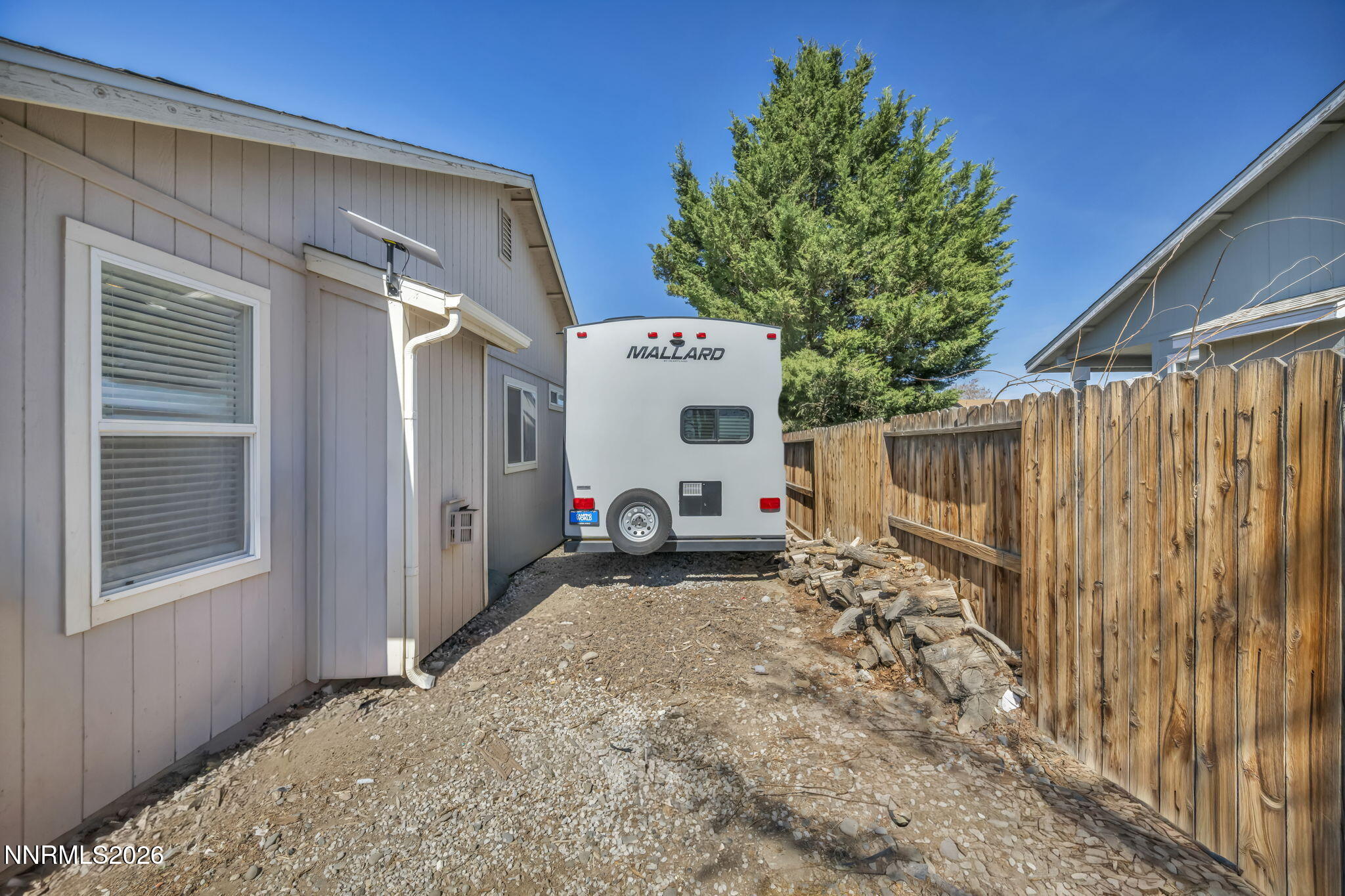 111 Relief Springs Road Fernley, NV 89408 - Photo 27 of 30 a view of a house with a backyard