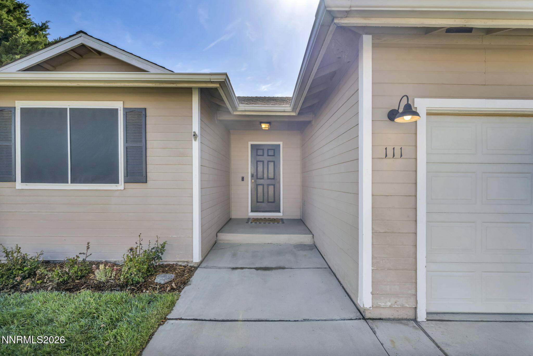 111 Relief Springs Road Fernley, NV 89408 - Photo 5 of 30 a view of a front door and a yard
