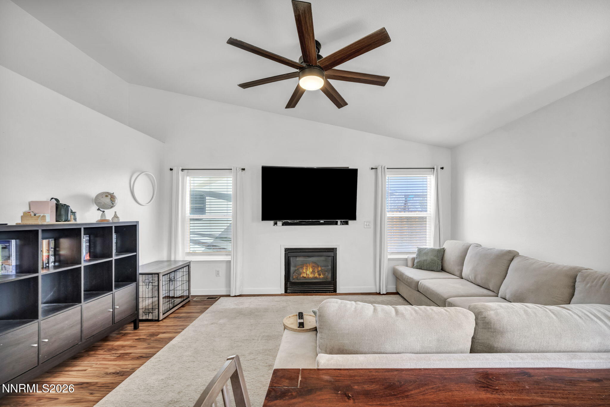 111 Relief Springs Road Fernley, NV 89408 - Photo 10 of 30 a living room with furniture and a flat screen tv