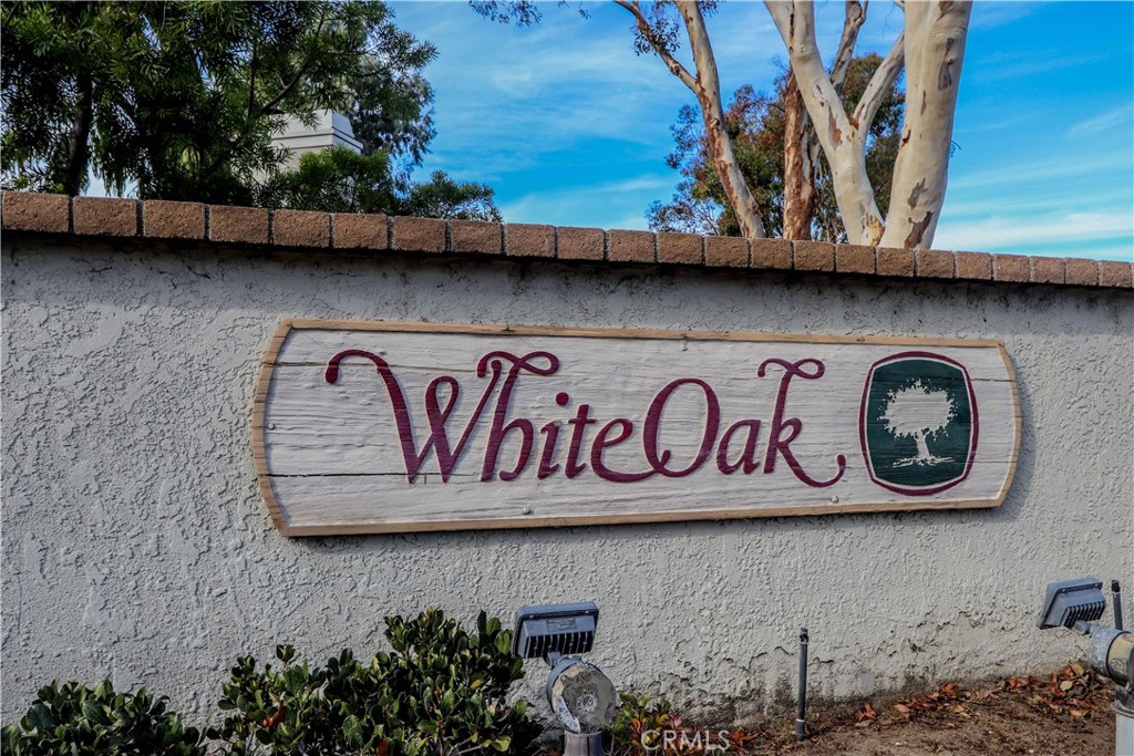 22196 Rim Pointe, Unit 6F Lake Forest, CA 92630 - Photo 1 of 1 a sign that is on the wall