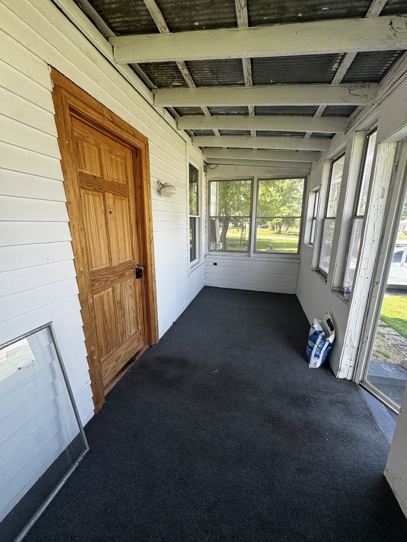 545 North Division Street Du Quoin, IL 62832 - Photo 16 of 17 a view of empty room with wooden floor and fan