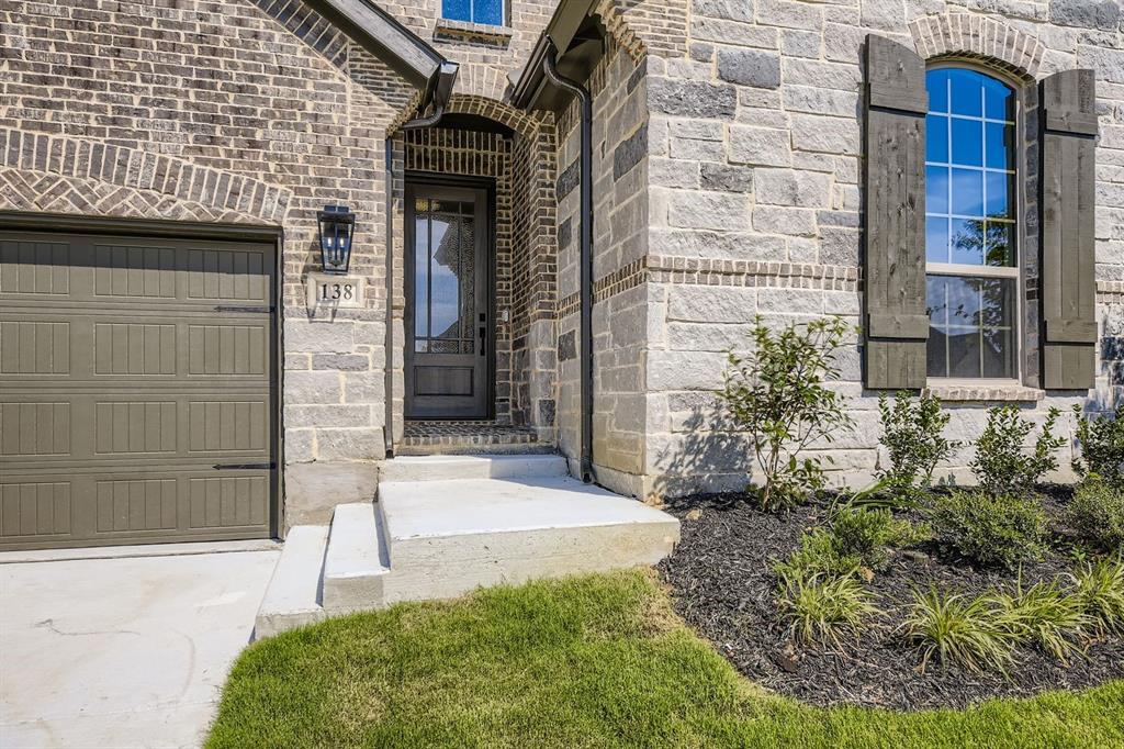 138 Sandie Drive Rhome, TX 76078 - Photo 3 of 28 a view of an entrance of the house
