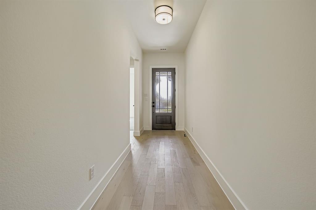 138 Sandie Drive Rhome, TX 76078 - Photo 4 of 28 a view of a hallway