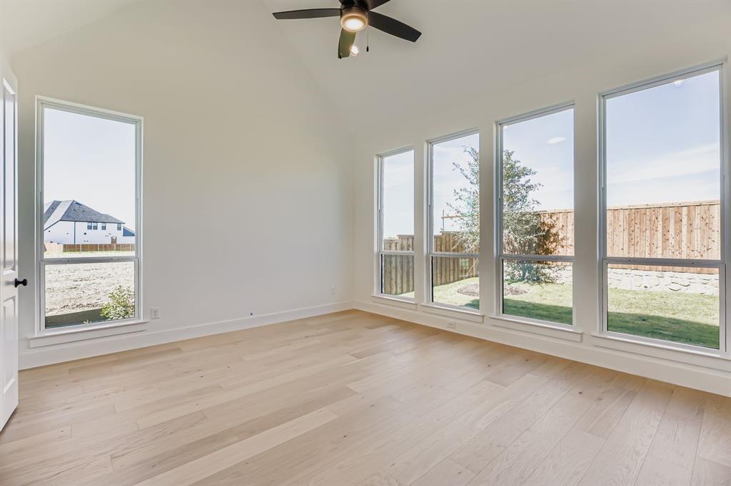 2730 Savannah Ridge Prosper, TX 75078 - Photo 9 of 28 a view of an empty room with a window