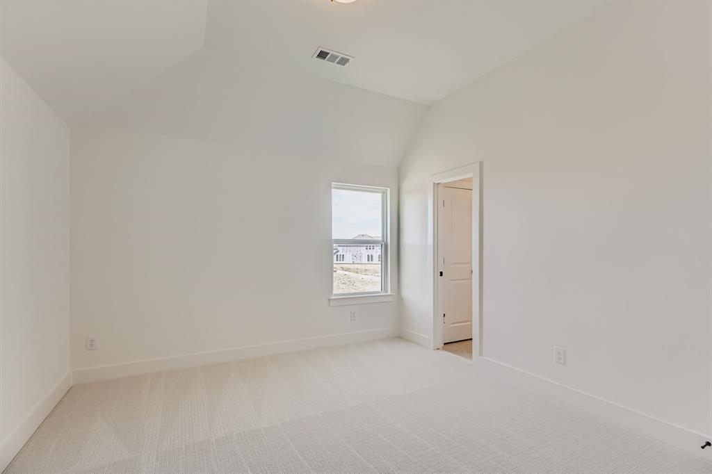 2730 Savannah Ridge Prosper, TX 75078 - Photo 18 of 28 a view of an empty room and window