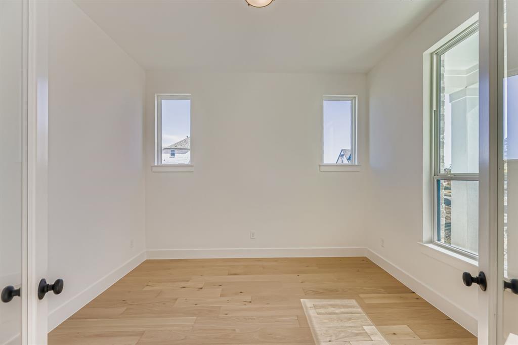 2730 Savannah Ridge Prosper, TX 75078 - Photo 7 of 28 a view of an empty room with a window