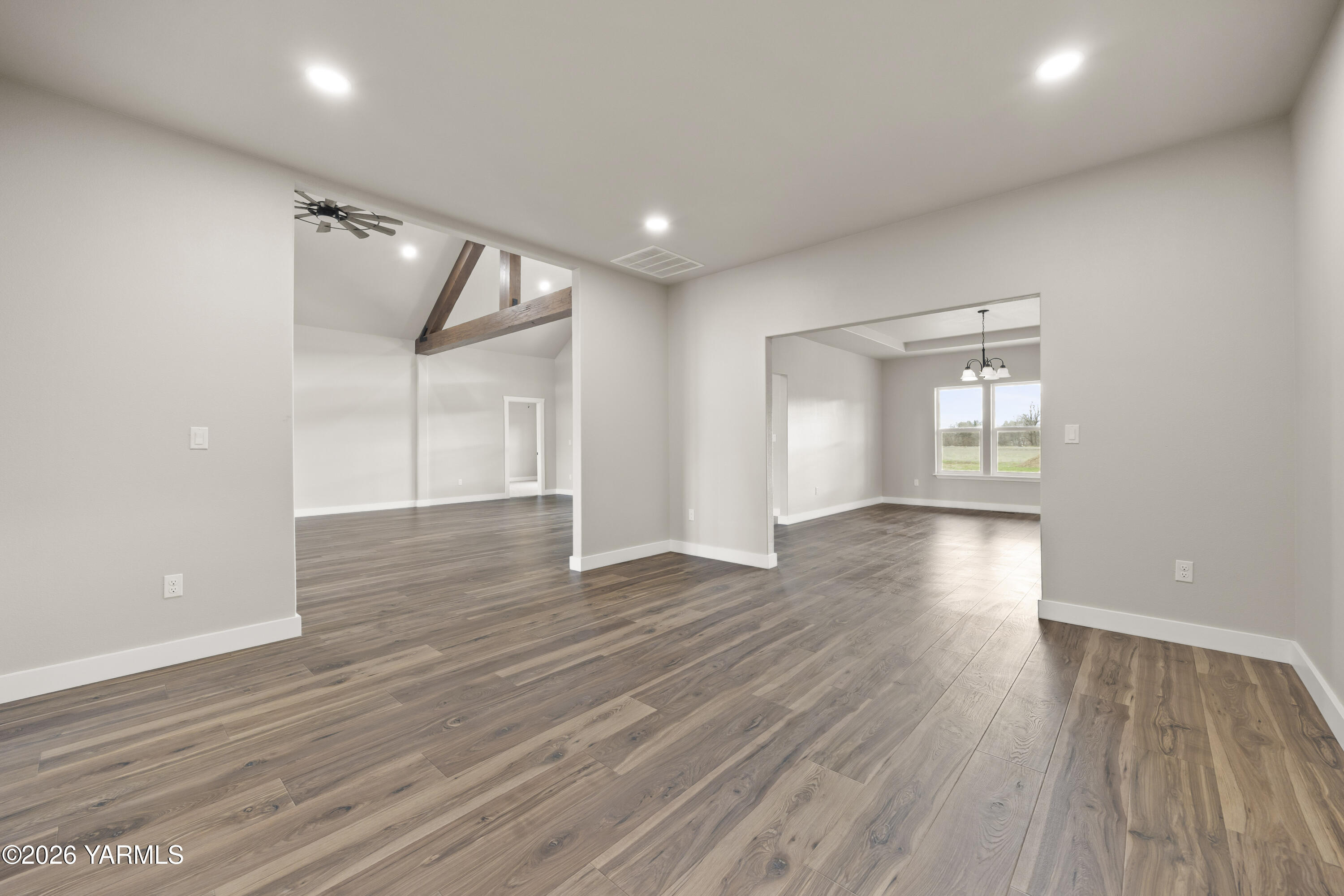 6133 South Moore Road Prosser, WA 99350 - Photo 5 of 54 wooden floor in an empty room with a window