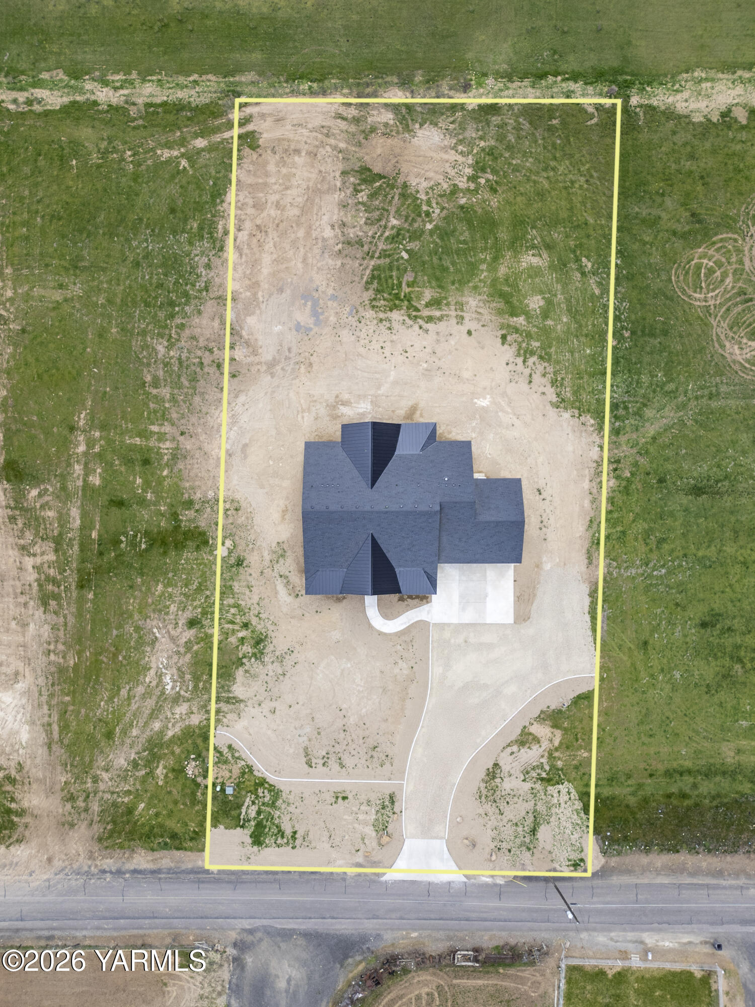 6133 South Moore Road Prosser, WA 99350 - Photo 53 of 54 a wooden bench sitting next to a lake