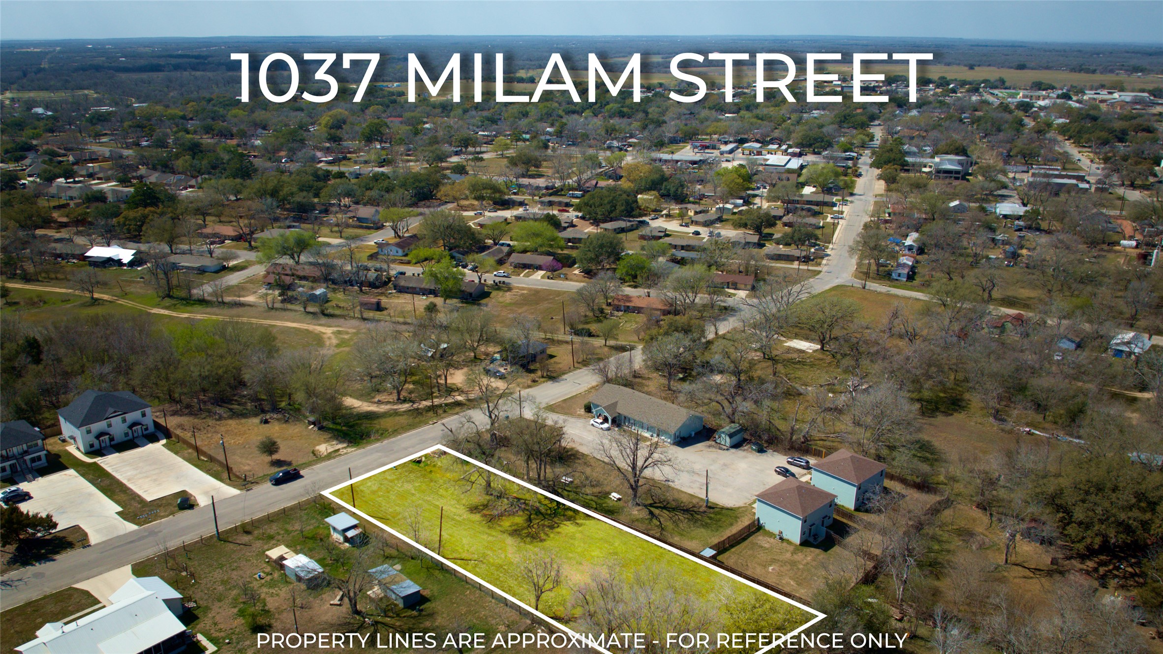 1037 East Milam Street Luling, TX 78648 - Photo 13 of 17 an aerial view of swimming pool yard and outdoor seating
