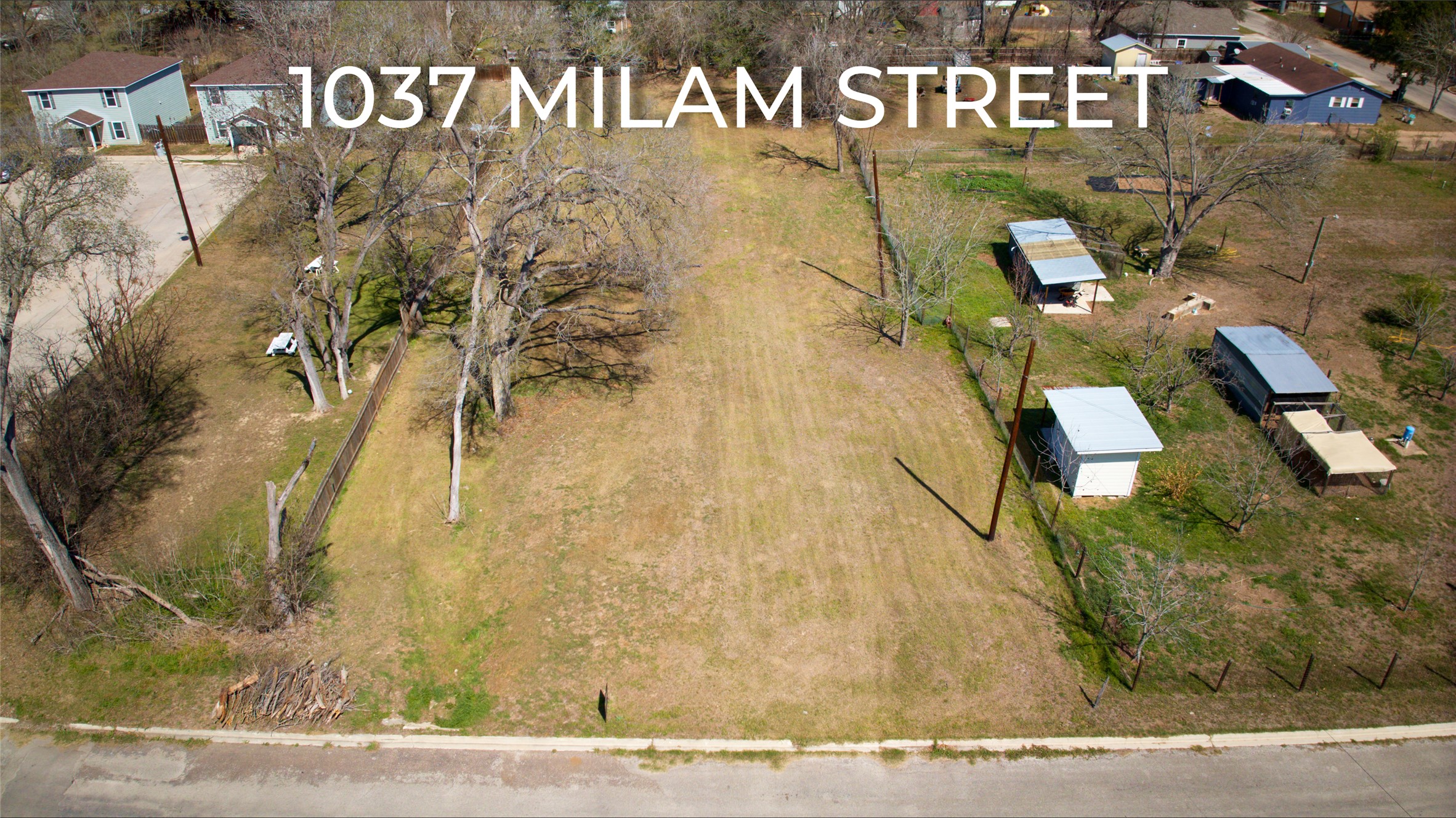 1037 East Milam Street Luling, TX 78648 - Photo 16 of 17 a view of a street