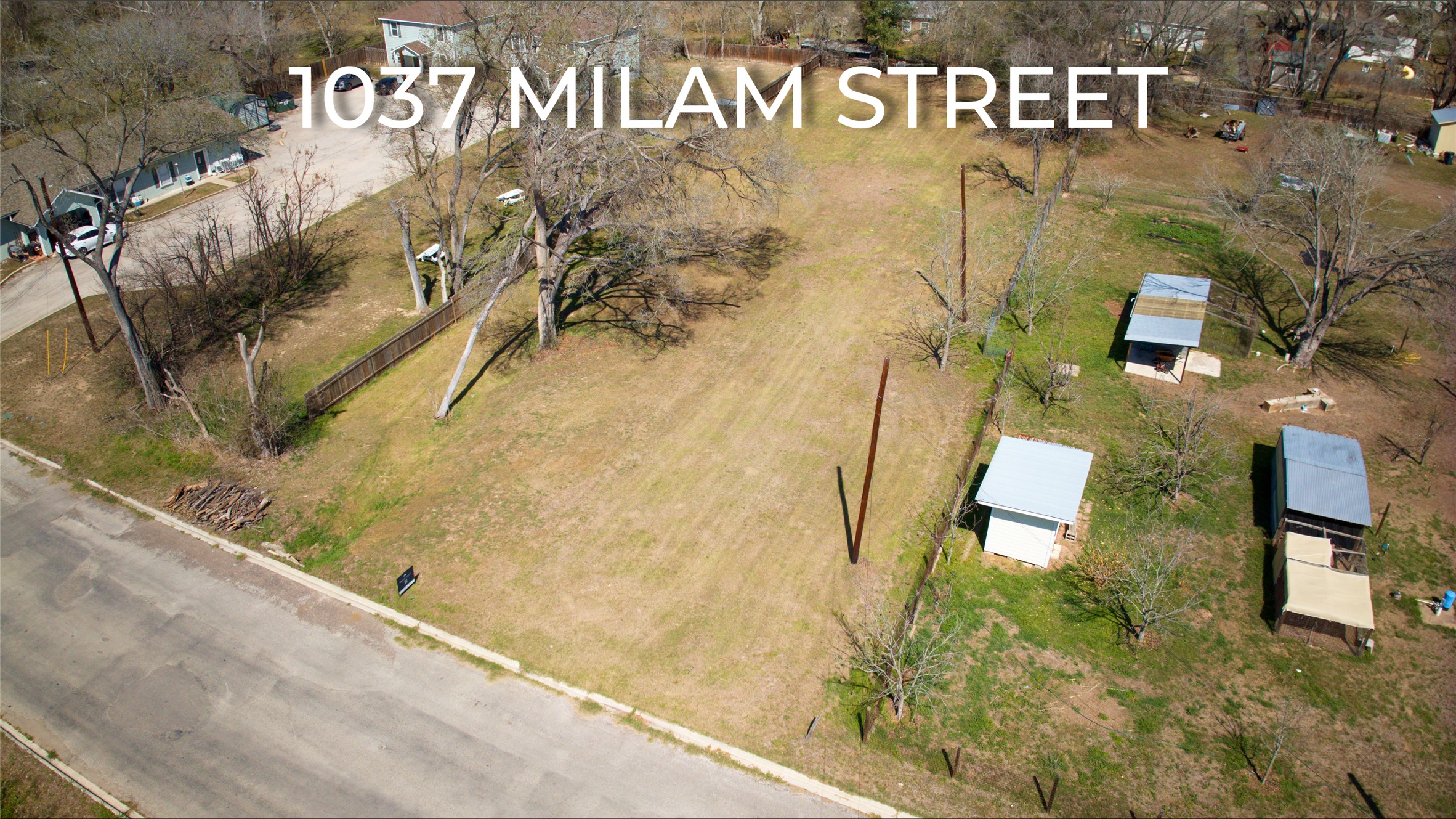 1037 East Milam Street Luling, TX 78648 - Photo 17 of 17 a view of a street sign
