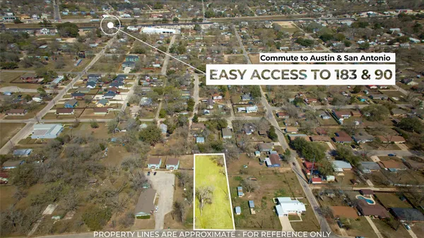 a street sign on a brick wall
