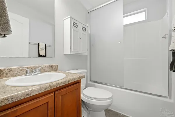 a swimming pool with outdoor seating yard and barbeque oven