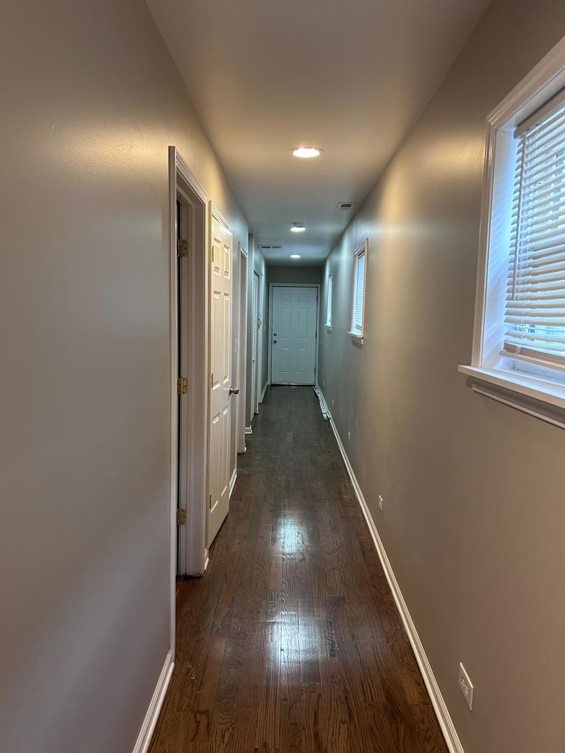 5905 South Indiana Avenue, Unit 1 Chicago, IL 60637 - Photo 5 of 13 a view of gallery with wooden floor