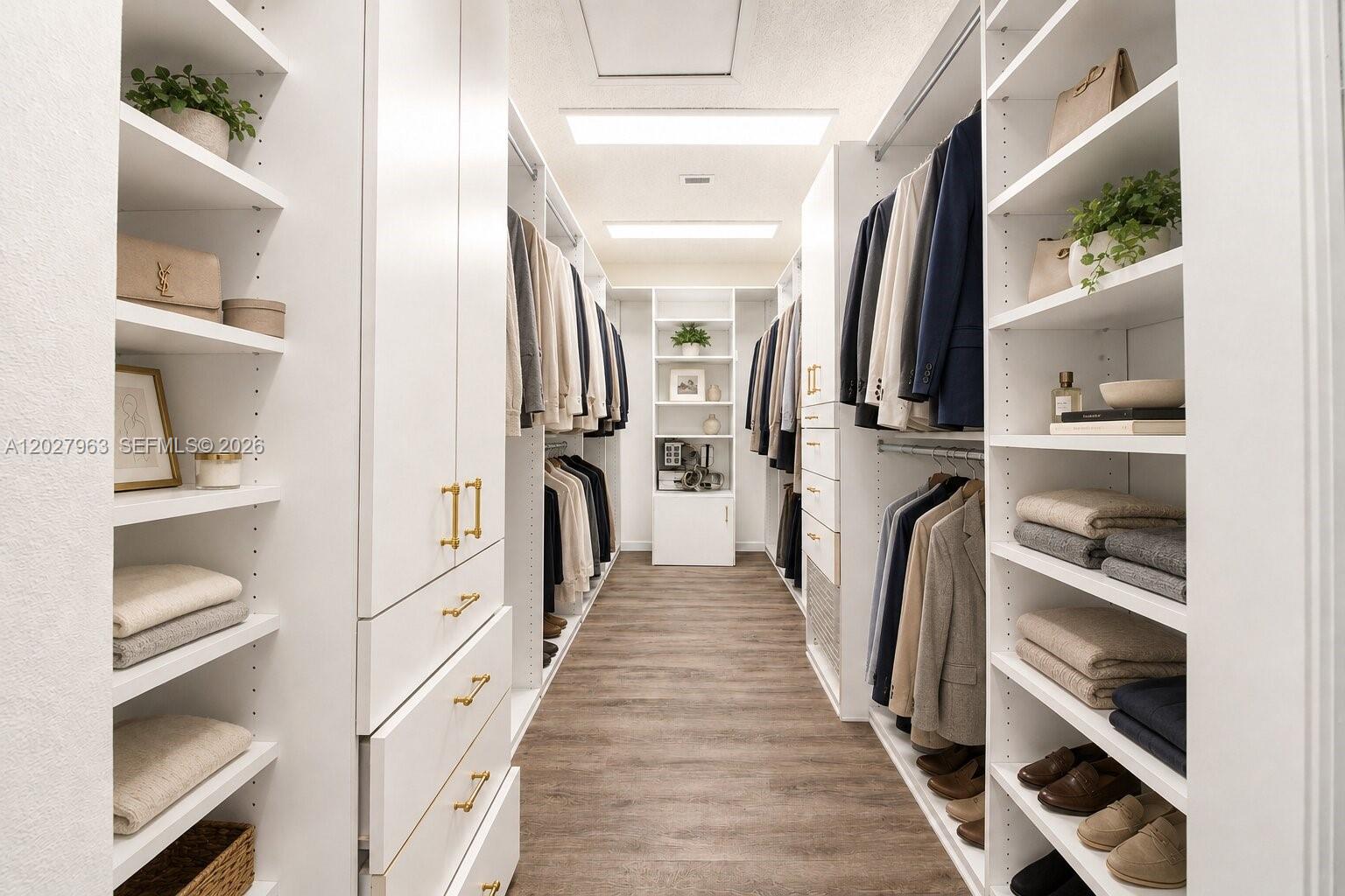 6646 Northwest 25th Terrace Boca Raton, FL 33496 - Photo 20 of 48 a view of walk in closet with clothes and shoes