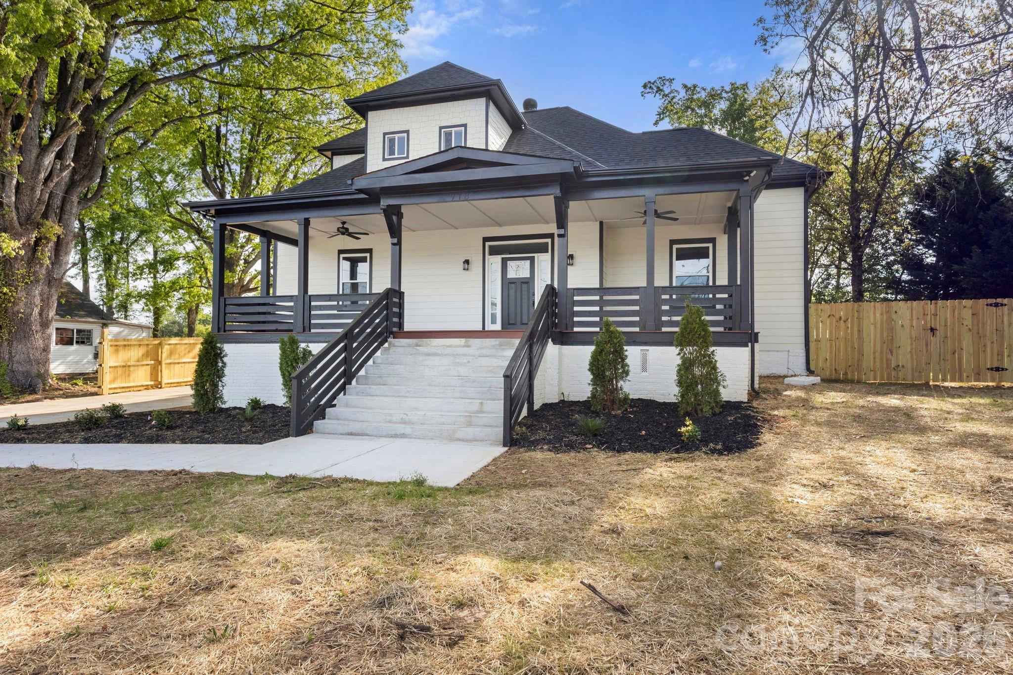 918 North New Hope Road Gastonia, NC 28054 - Photo 1 of 37 a front view of a house with a yard