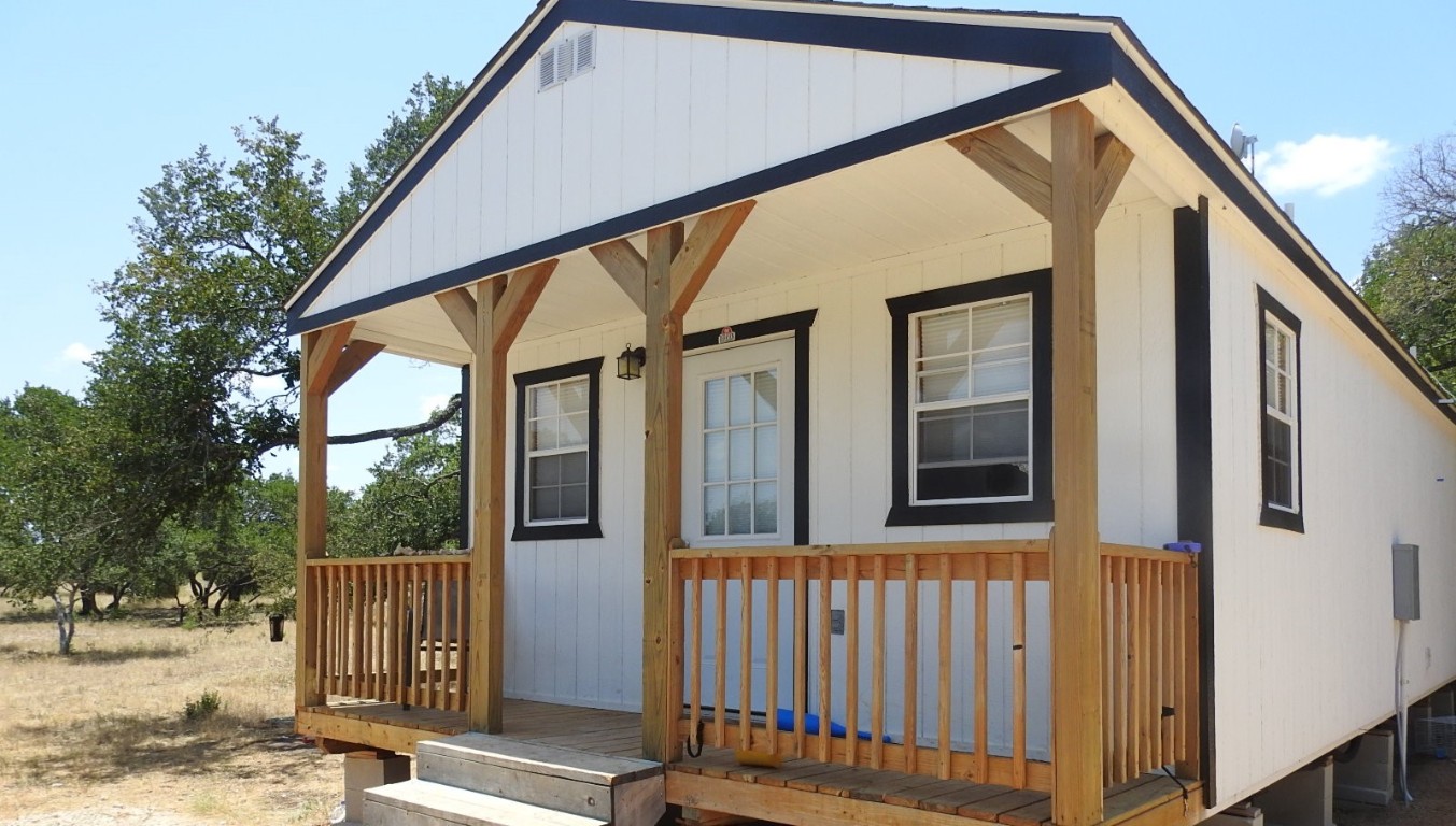 a view of a house with a street