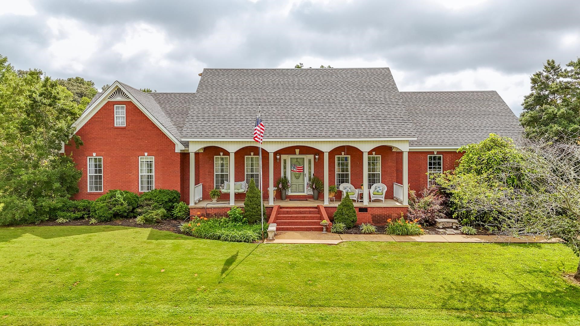 a front view of house with outdoor space and street view