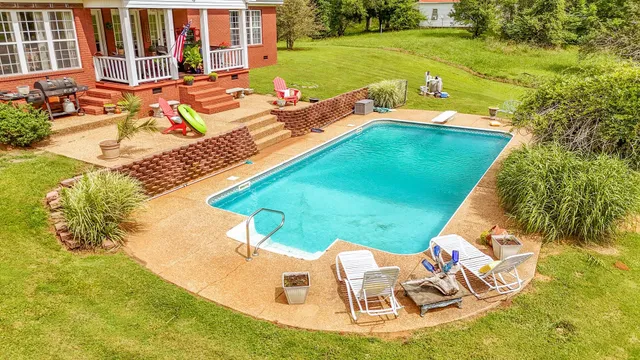 a view of a field with an trees