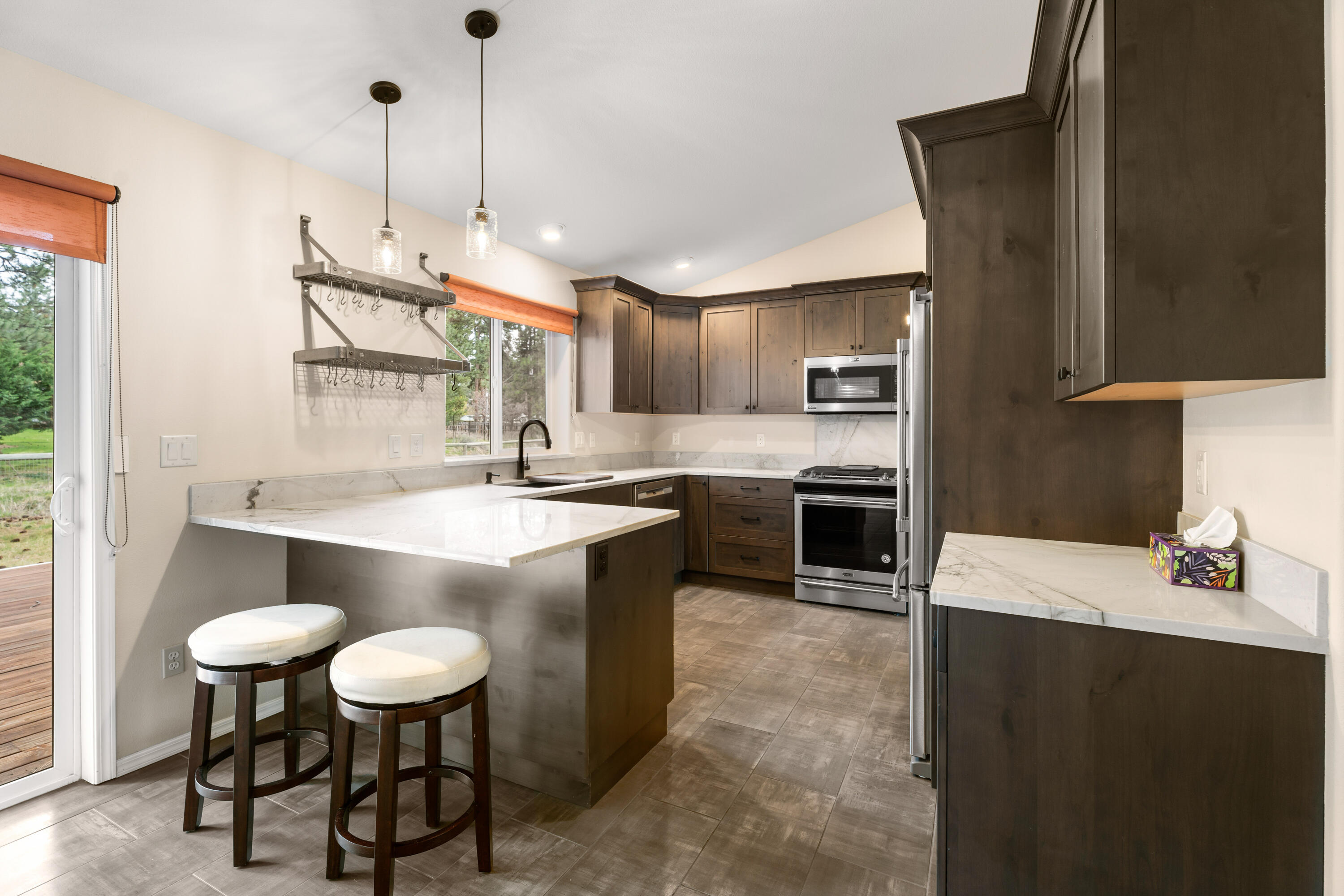 19405 Indian Summer Road Bend, OR 97702 - Photo 17 of 37 Beautifully remodeled kitchen with high end appliances