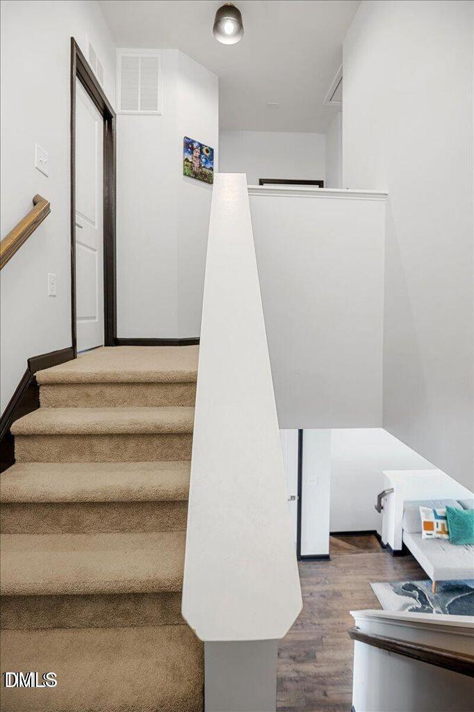 520 Austin View Boulevard Wake Forest, NC 27587 - Photo 20 of 38 520 Austin View Blvd stairs landing