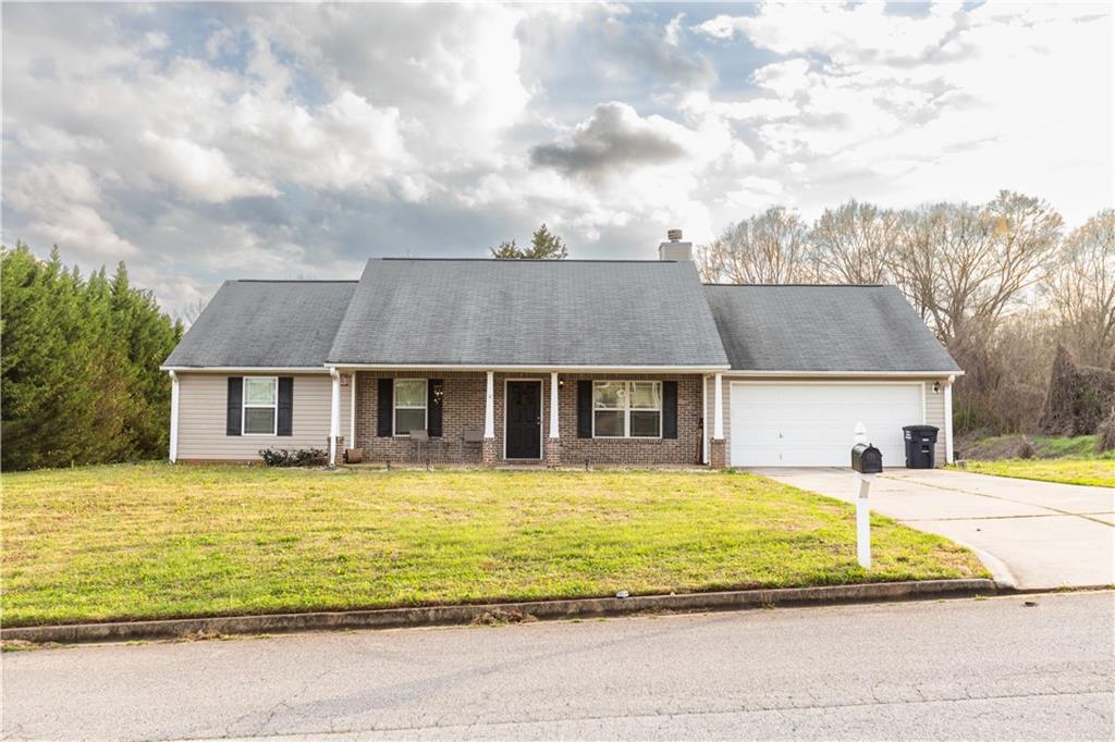144 Ashley Lane Athens, GA 30607 - Photo 1 of 1 a view of a house with a swimming pool and sitting area