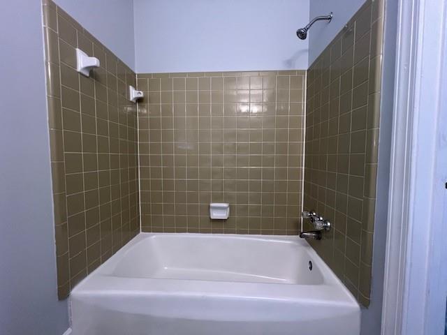 6935 Fielder Road Rex, GA 30273 - Photo 11 of 22 a bathroom with a bathtub
