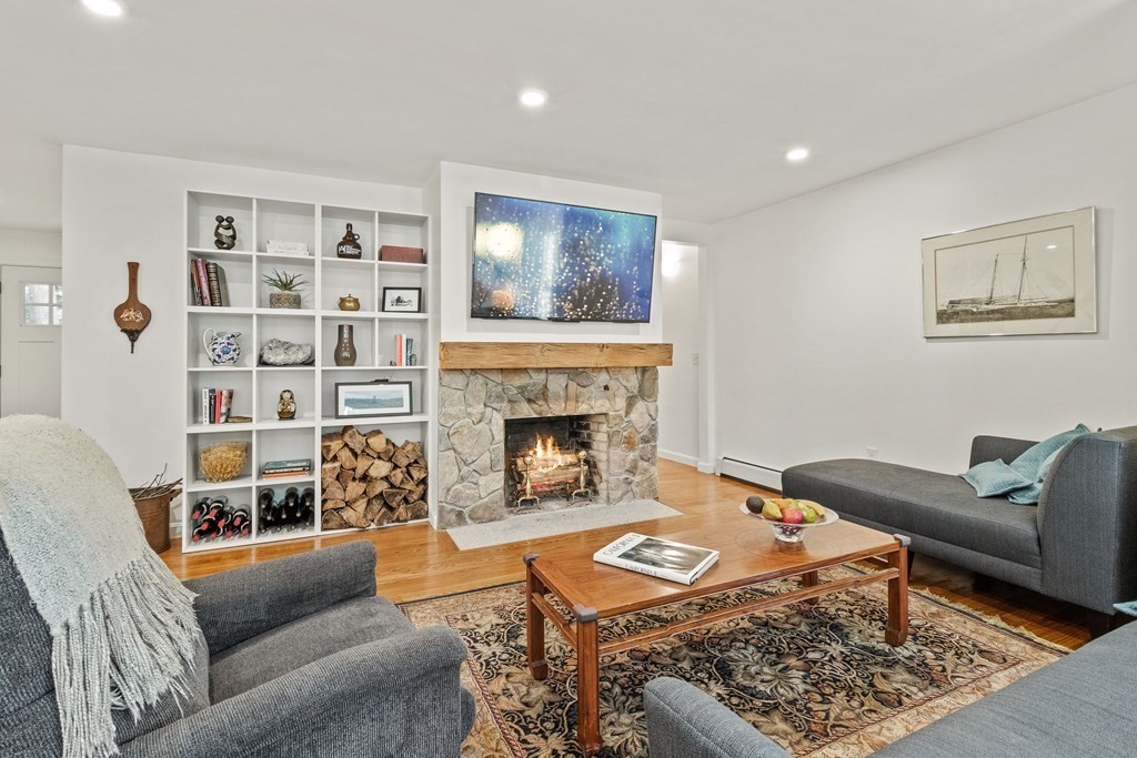 21 Bypass Road Lincoln, MA 01773 - Photo 2 of 21 a living room with furniture and a fireplace
