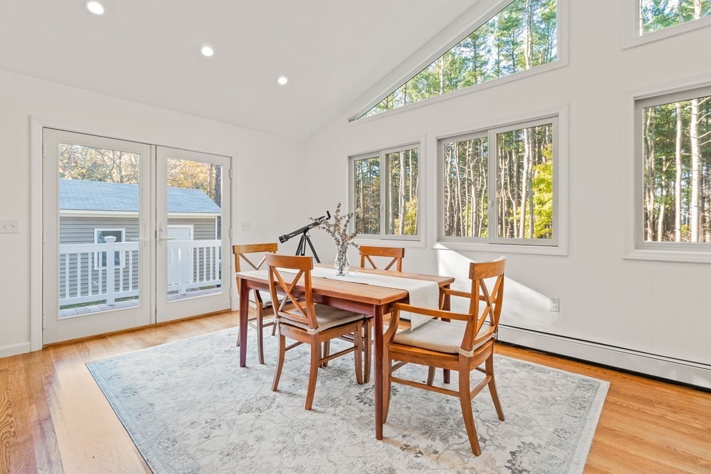 21 Bypass Road Lincoln, MA 01773 - Photo 6 of 21 a dining room with furniture and wooden floor