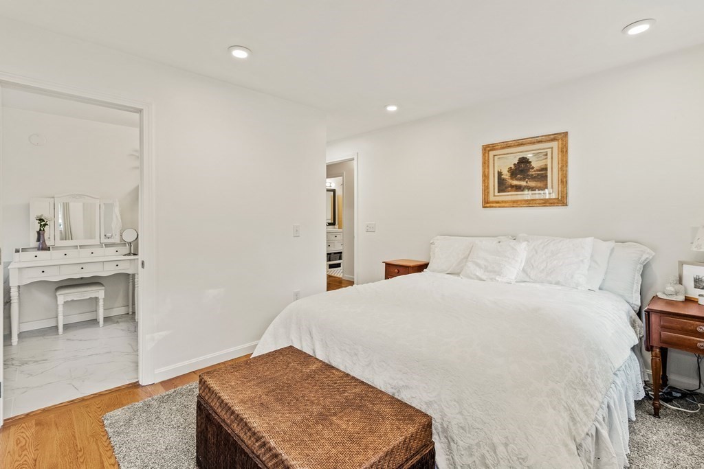 21 Bypass Road Lincoln, MA 01773 - Photo 9 of 21 a bedroom with a bed and a table