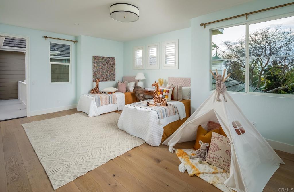 667 Lynwood Drive Encinitas, CA 92024 - Photo 24 of 36 a living room with furniture and a large window
