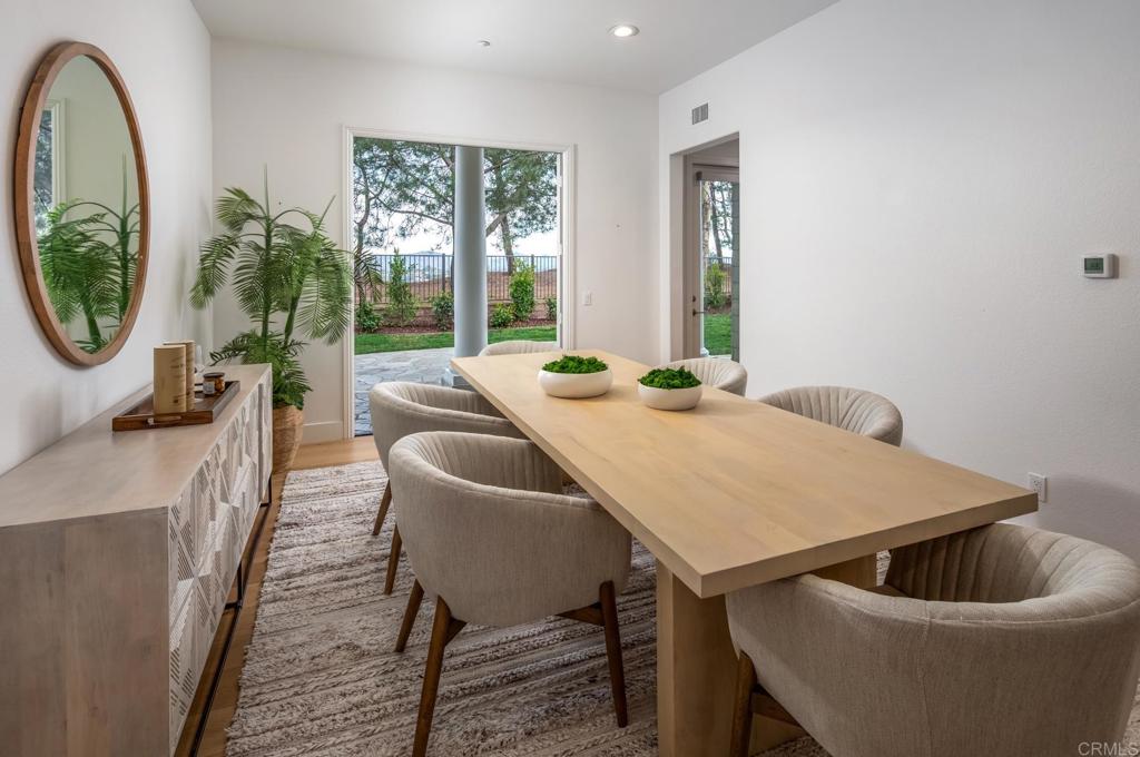 667 Lynwood Drive Encinitas, CA 92024 - Photo 8 of 36 a living room with furniture and a potted plant