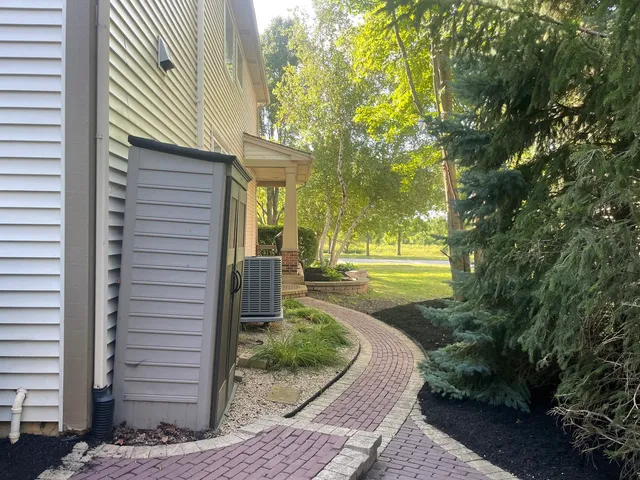 a view of a back yard of the house