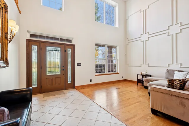 a bedroom with furniture and windows