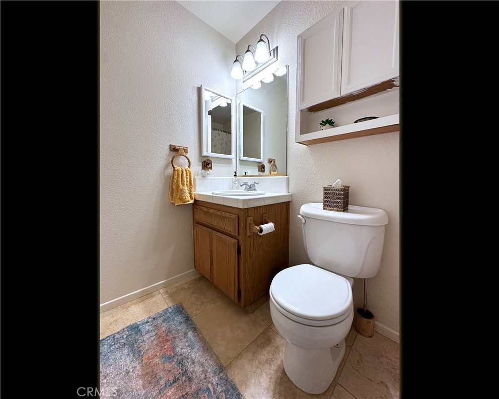 17371 Mockingbird Canyon Road Riverside, CA 92504 - Photo 13 of 73 Common Bathroom