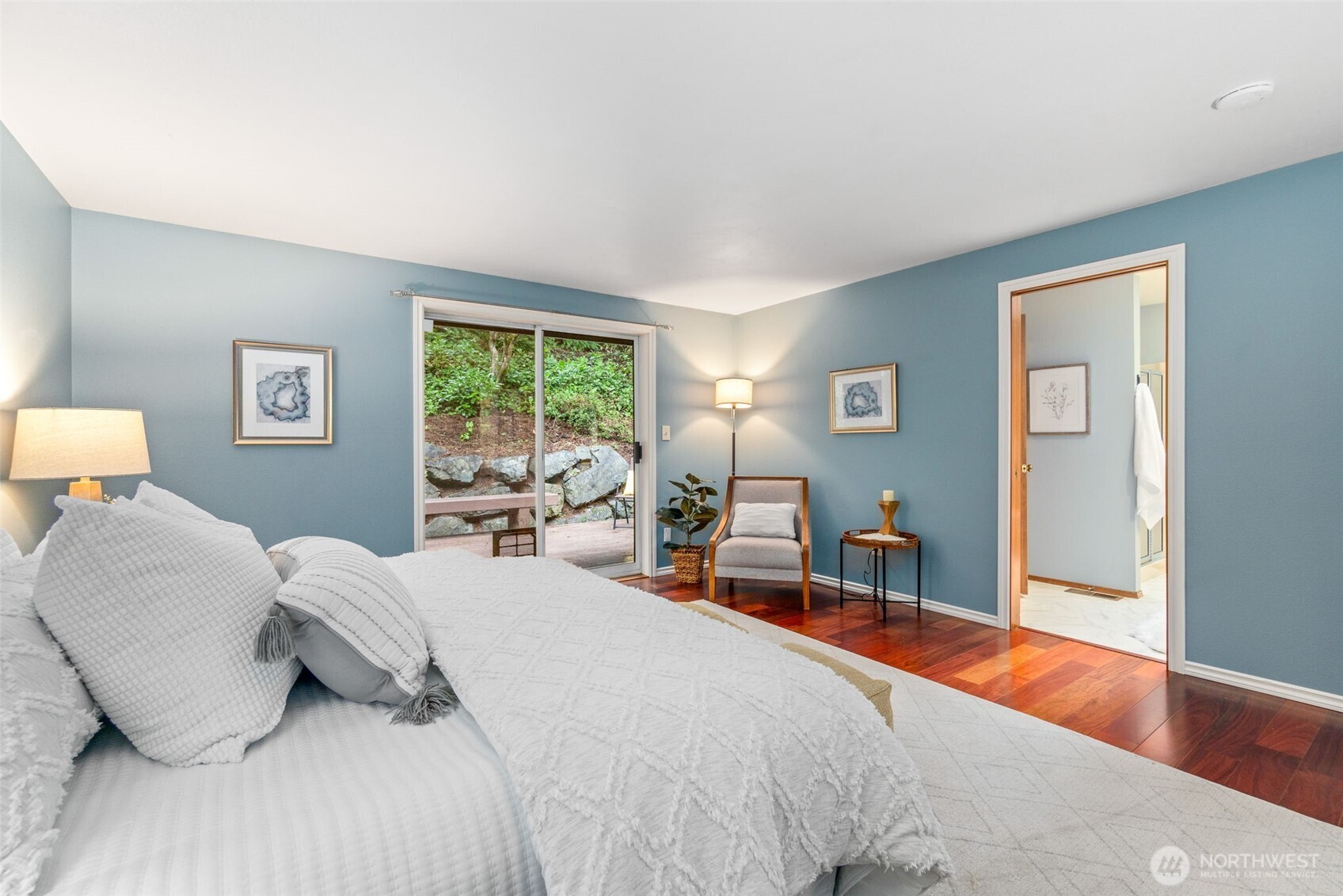 21007 Pioneer Way Edmonds, WA 98026 - Photo 13 of 27 a bedroom with a bed and wooden floor