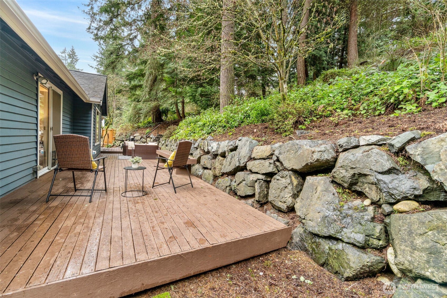 21007 Pioneer Way Edmonds, WA 98026 - Photo 20 of 27 a view of a chairs and table in backyard