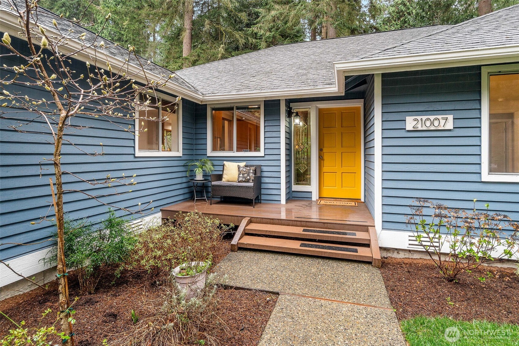 21007 Pioneer Way Edmonds, WA 98026 - Photo 2 of 27 a backyard of a house with outdoor seating