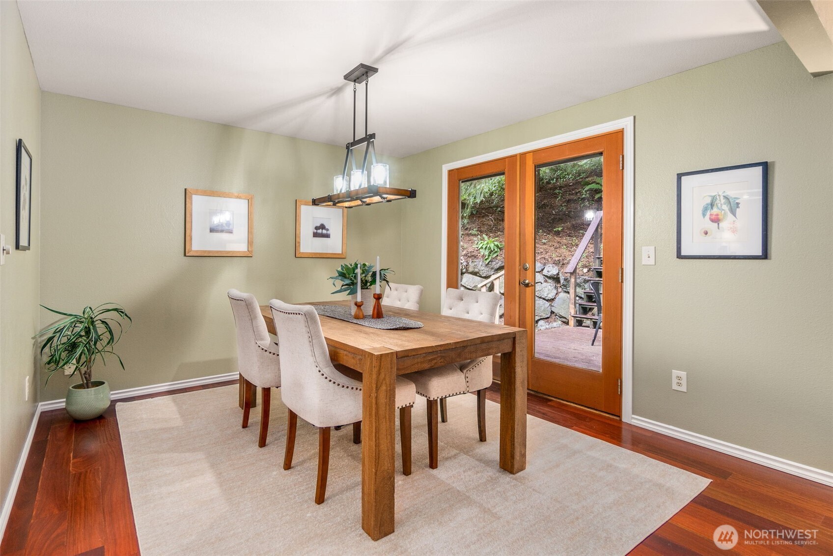 21007 Pioneer Way Edmonds, WA 98026 - Photo 6 of 27 a view of a dining room with furniture window and wooden floor