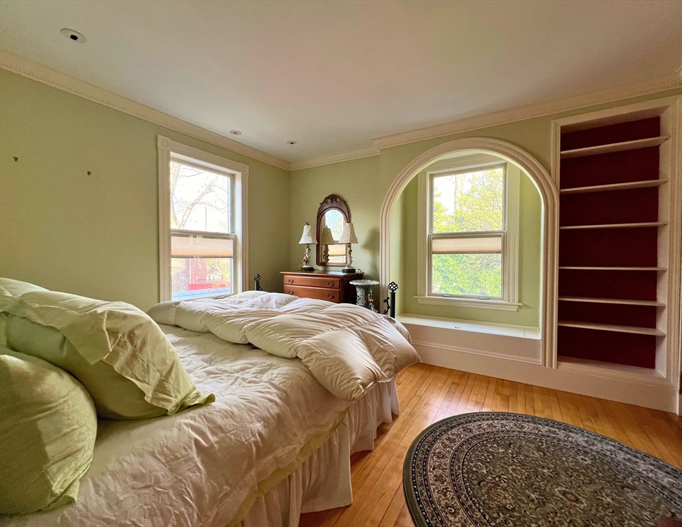 12 Brook Street Wellesley, MA 02482 - Photo 11 of 11 a bed sitting in a bedroom next to a window