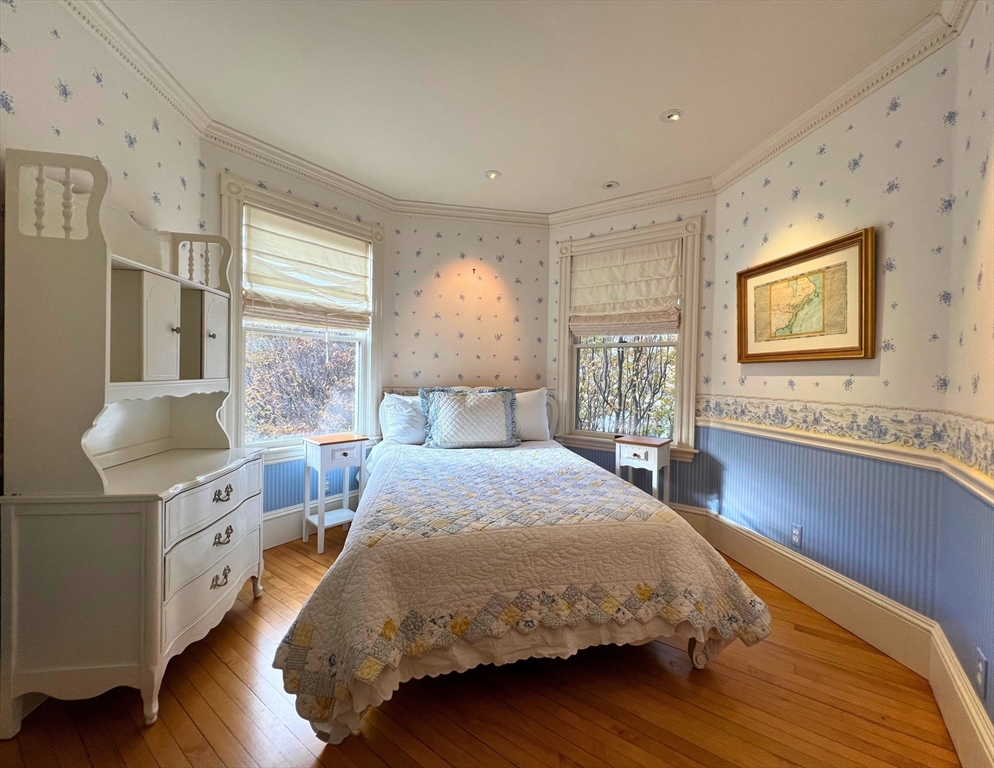 12 Brook Street Wellesley, MA 02482 - Photo 8 of 11 a bedroom with a bed and wooden floor