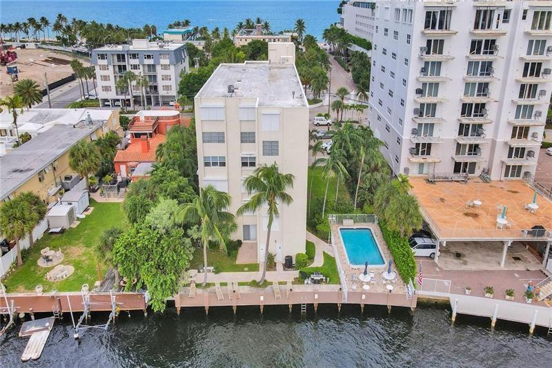 101 North Birch Road, Unit 303 Fort Lauderdale, FL 33304 - Photo 22 of 29 an aerial view of multiple houses with yard