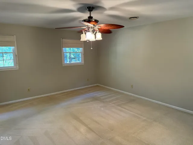 a bathroom with a double vanity sink and mirror