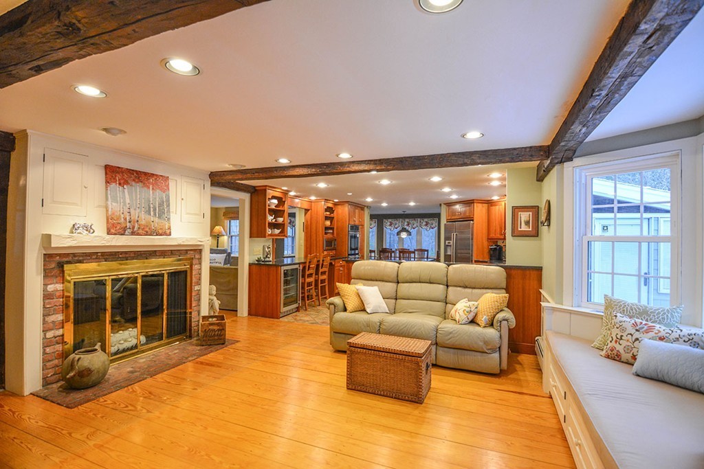4 Scribner Road Tyngsborough, MA 01879 - Photo 4 of 23 a living room with furniture and kitchen view