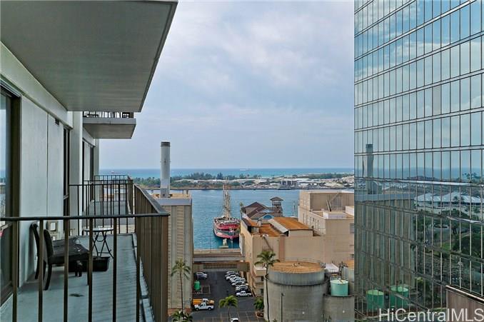 225 Queen Street, Unit 15E Honolulu, HI 96813 - Photo 1 of 1 a view of a balcony with many windows